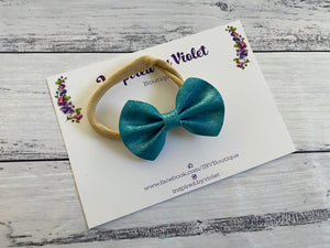 2.7” Chloe mini Bow on band - Teal Shimmer